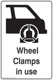 Information Wheel Clamps In Use Safety Signs and Stickers